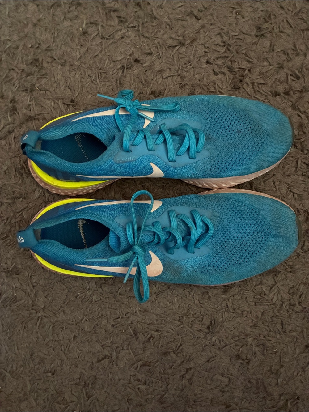 Nike Teal Blue Running Sneakers with White Swoosh and Yellow Accents